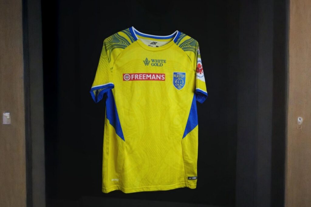 Kerala Blasters Unveils New Home Kit Featuring Thiruvananthapuram’s Symbol and Slogan Kerala Blasters Unveils New Home Kit Featuring Thiruvananthapuram’s Symbol and Slogan