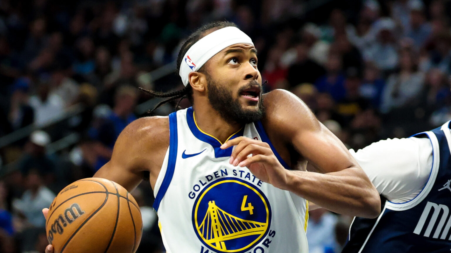 Warriors Face Injury Setback in Overtime Victory Against Mavericks