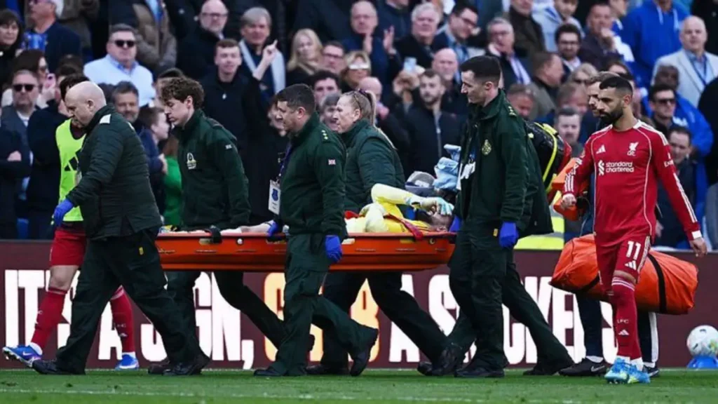 Third-choice goalkeeper makes debut in Merseyside derby after Liverpool’s Mamardashvili is stretchered off